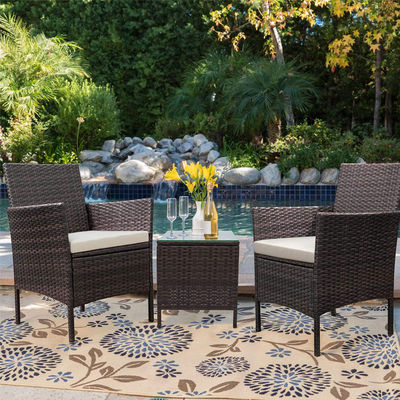 Conjunto de móveis de exterior com poltronas empilháveis e cadeiras de vime de rotão sintético