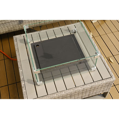 Sofá exterior de rotão com mesa de fogão e caixa de armazenamento